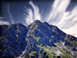 Et kors på et mektig fjell - Opphav: Fotografi (Pezibear) - pixabay.com (Creative Commons)